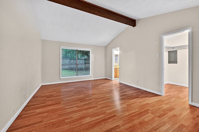 Empty room with light wood-style flooring and baseboards | Image 11