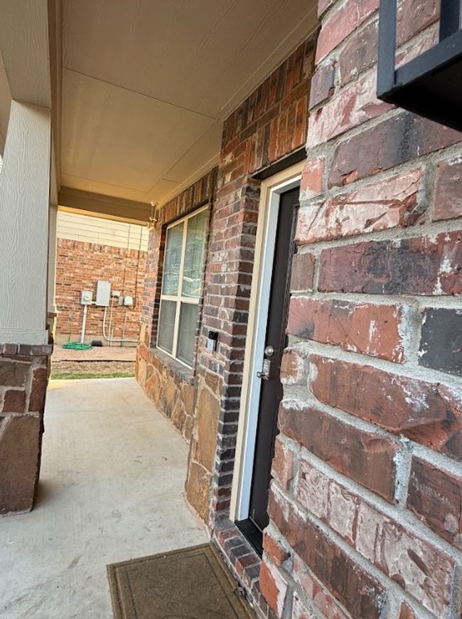View of patio / terrace with a porch. | Image 12