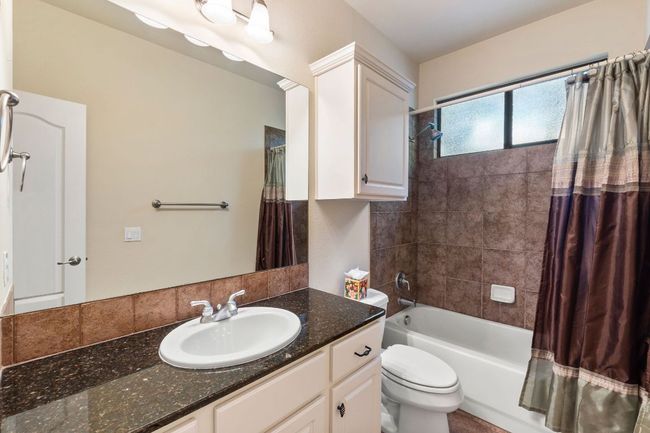 Full bath with vanity and shower / bath combo | Image 17