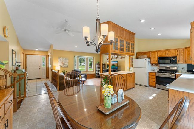 Custom built cabinetry provides ample kitchen storage, prep and serving space. | Image 10