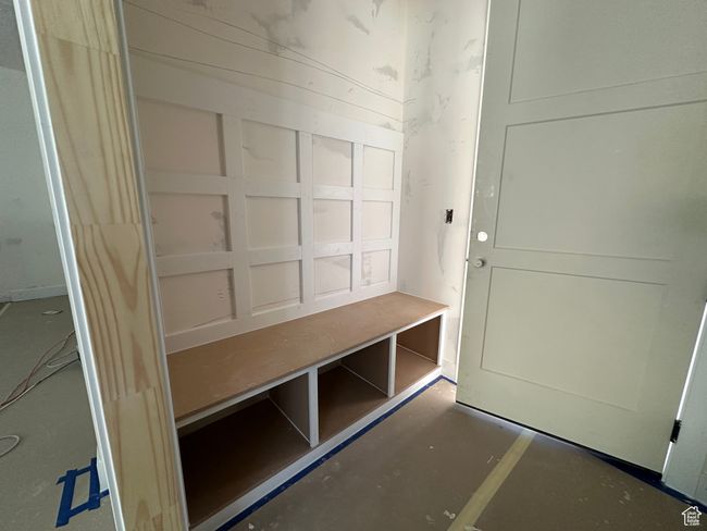 Mudroom with concrete flooring | Image 9