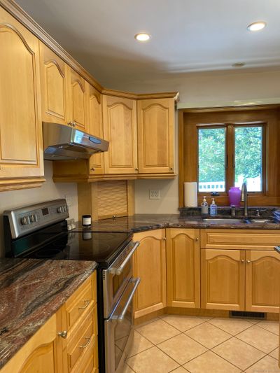 Granite Counters, Stainless Steel Appliances, Tile Floor | Image 3