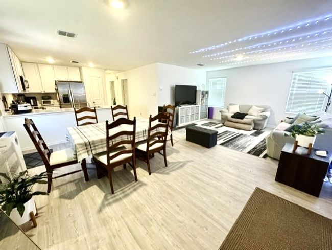 Dining space featuring light wood-style flooring | Image 8