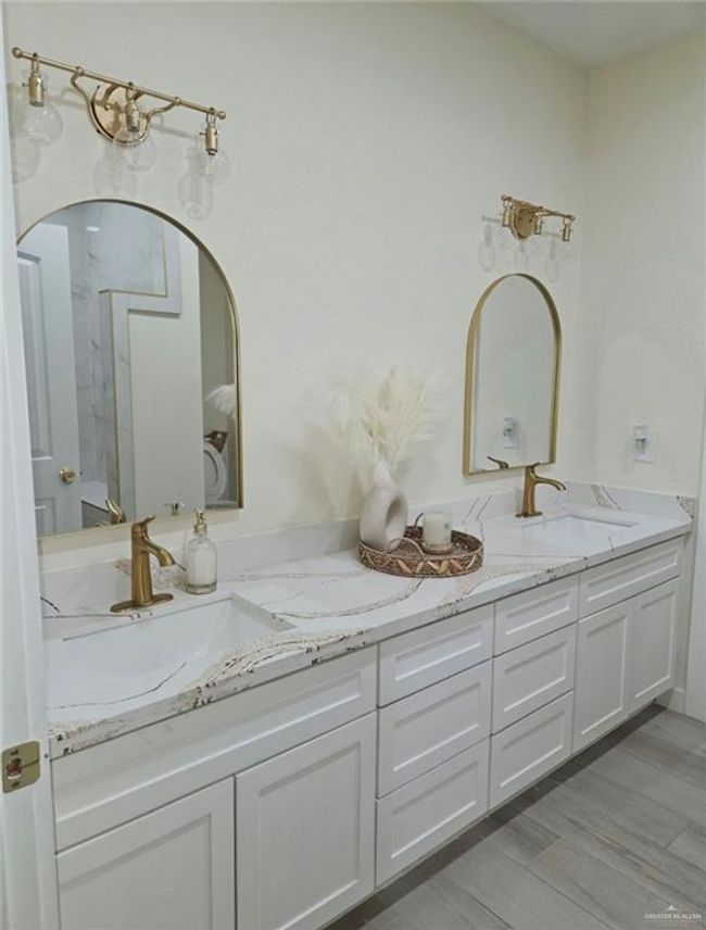 Bathroom with a shower, vanity, and hardwood / wood-style flooring | Image 31