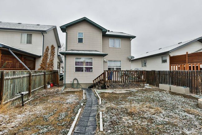 255 Heritage Court W, Home with 5 bedrooms, 3 bathrooms and 4 parking in Lethbridge AB | Image 3