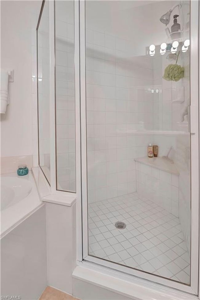 Master Bathroom featuring a tile shower | Image 17