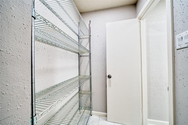 Walk-in pantry from garage | Image 15