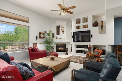 The family room is spacious and opens to the kitchen. | Image 2