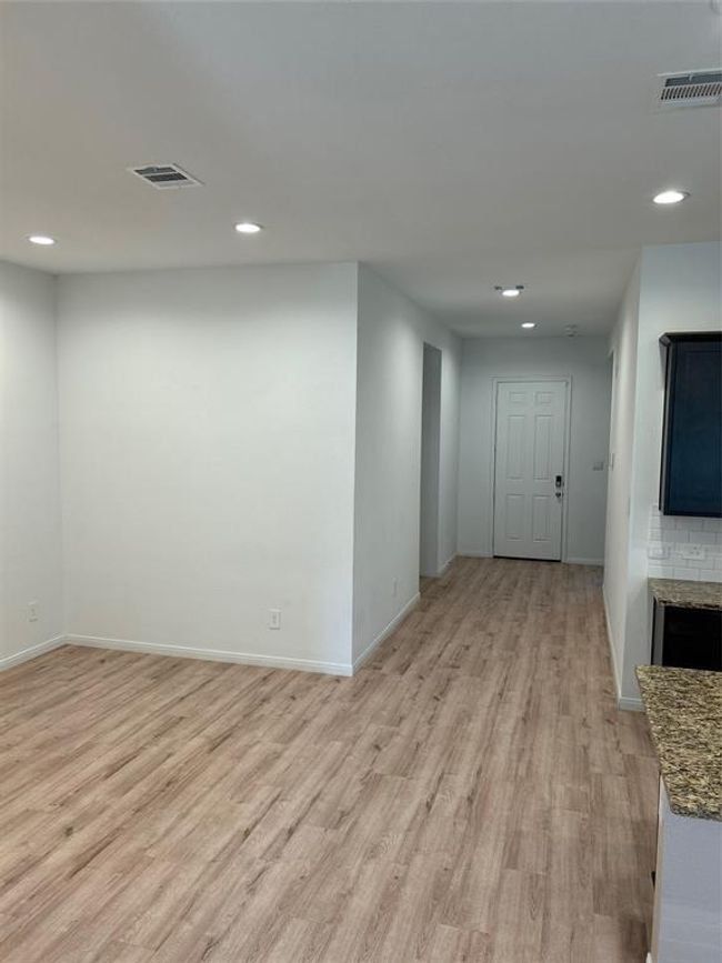 Family room view to front door | Image 10