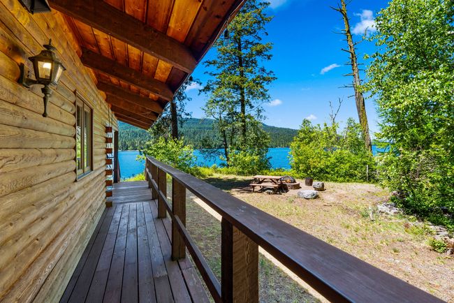 View of wooden deck off of front of house | Image 8