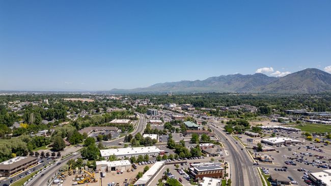 Drone / aerial view of a mountainous background and a highway | Image 40