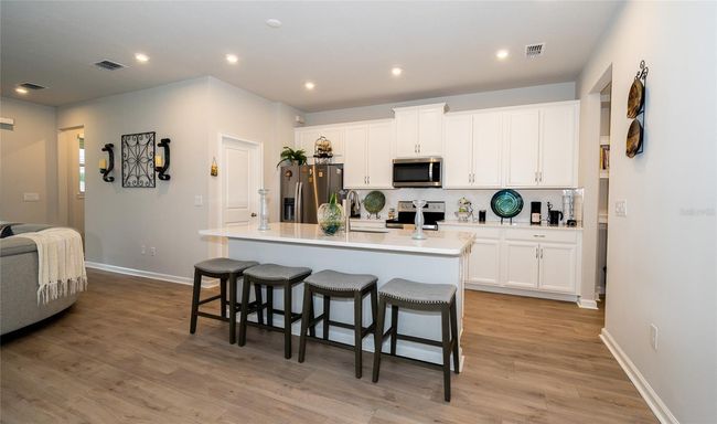 26082 Woven Wicker Bnd, Townhouse with 3 bedrooms, 3 bathrooms and null parking in LUTZ FL | Image 8