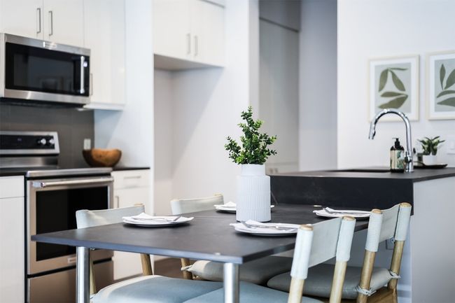 Its integrated design keeps the kitchen feeling streamlined while still providing a functional eating area that blends effortlessly with the rest of the room | Image 18