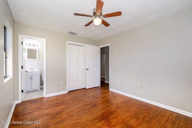 Primary bedroom with half bath | Image 10
