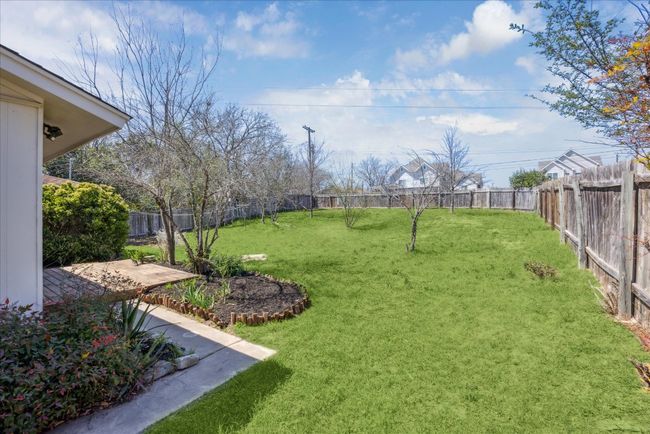 View of yard featuring a fenced backyard | Image 25