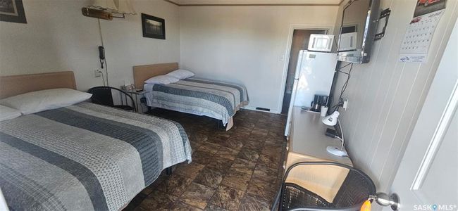 Bedroom with stone finish flooring | Image 28