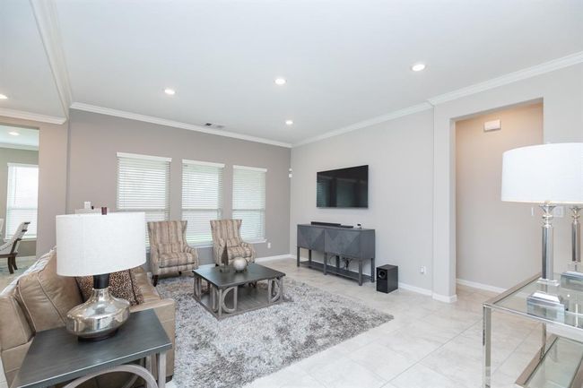 living room welcoming and functional environment. | Image 8