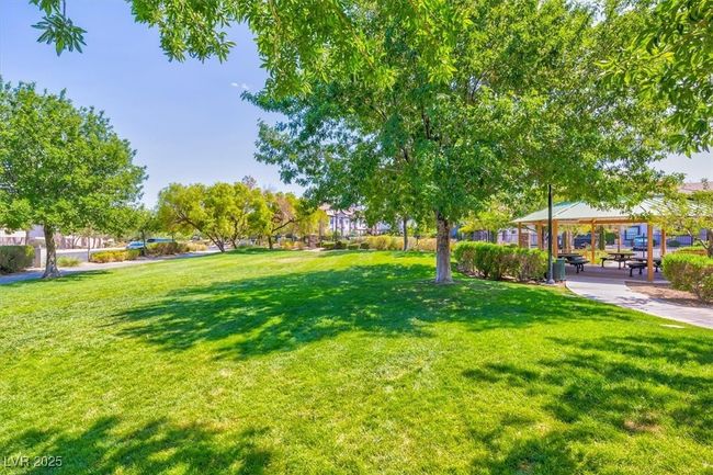 Surrounding community with a lawn and a gazebo | Image 28
