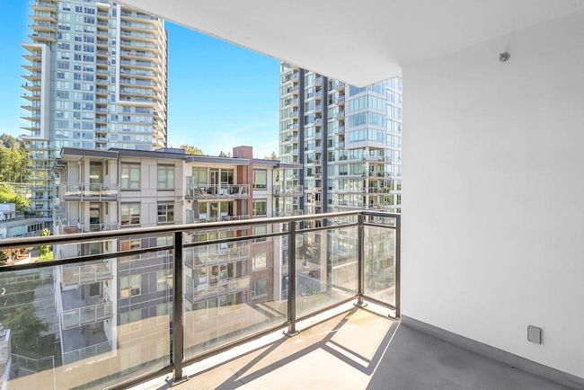Balcony with a view of city | Image 19