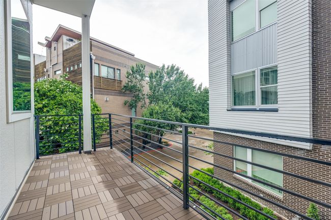 Second level - located off the dining room is your smaller patio of the two. | Image 36