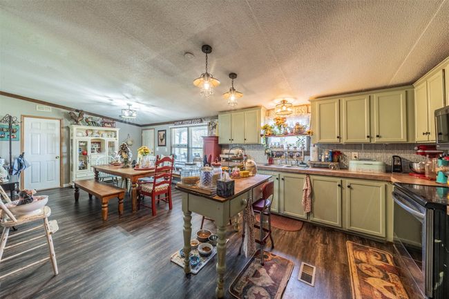 View from kitchen to dinning room. | Image 7