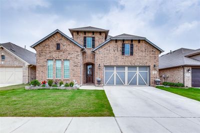 View of front featuring a front lawn | Image 1