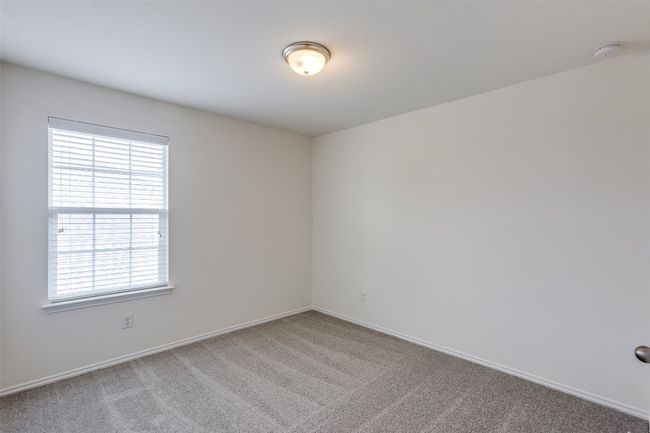 View of carpeted spare room | Image 20
