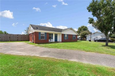 Ranch-style home featuring a front yard | Image 2