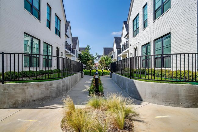 View of home's community with a residential view and fence | Image 33