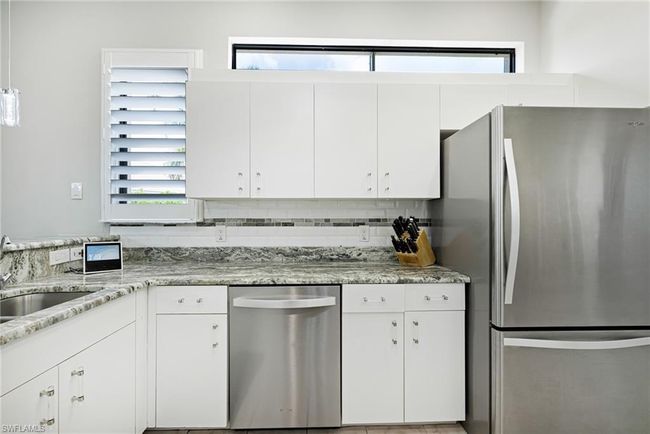 12802 Maiden Cane Ln, Condo with 3 bedrooms, 2 bathrooms and 2 parking in BONITA SPRINGS FL | Image 9