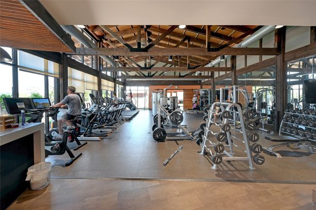 Workout area with lofted ceiling | Image 31