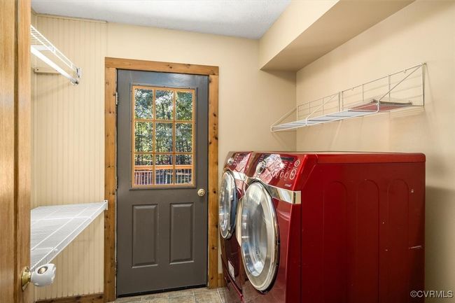 Laundry area featuring separate washer and dryer | Image 40