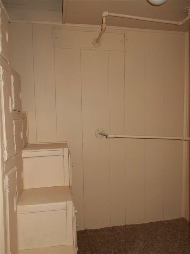 View of spacious closet | Image 11
