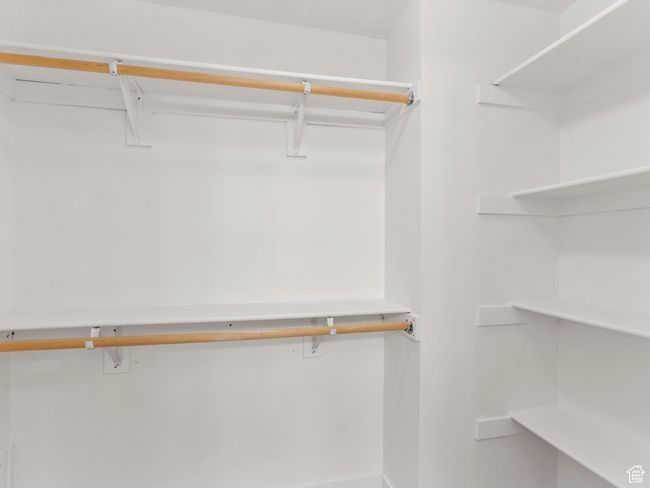 View of spacious closet | Image 11