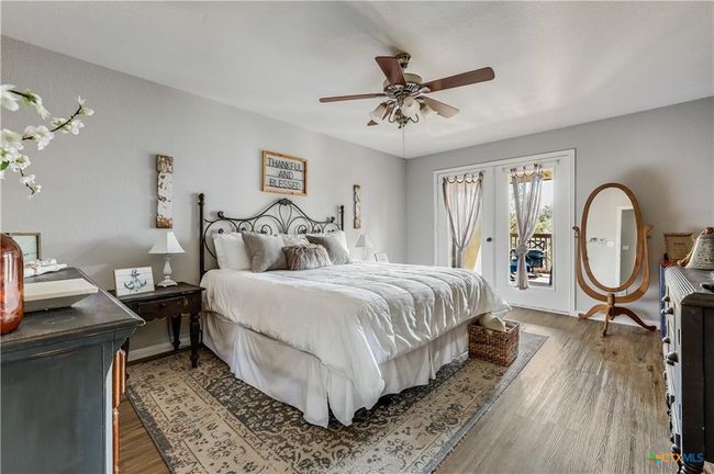 Bedroom with access to exterior | Image 26