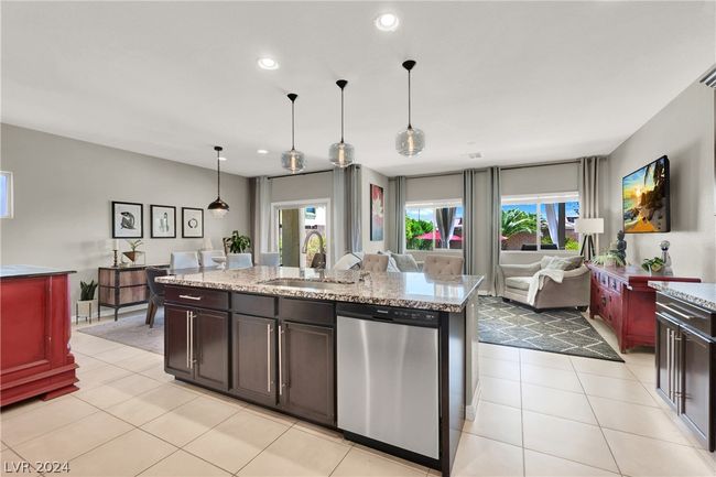 Kitchen and family room over look the beautiful backyard | Image 11