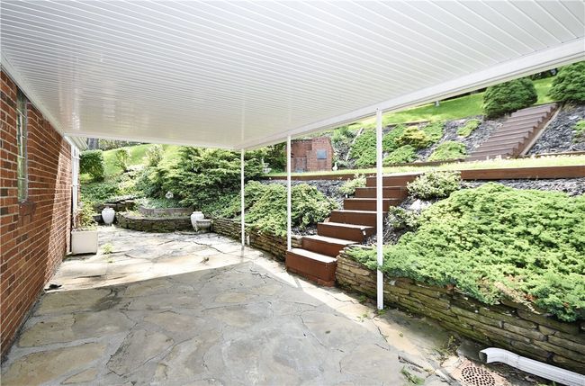 Nicely covered back private patio | Image 21