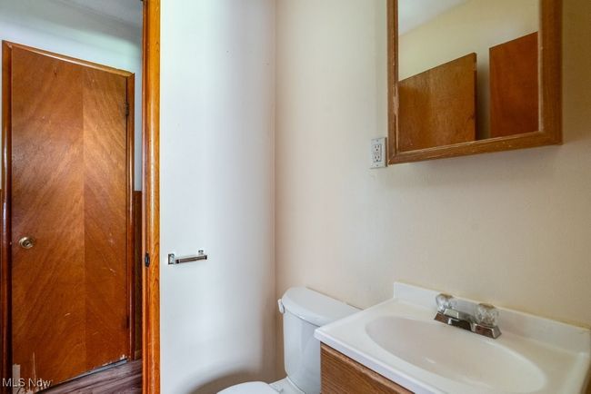 Half bath featuring toilet and vanity | Image 17
