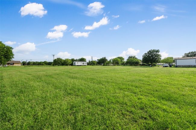 View of grassy yard featuring a rural view | Image 7