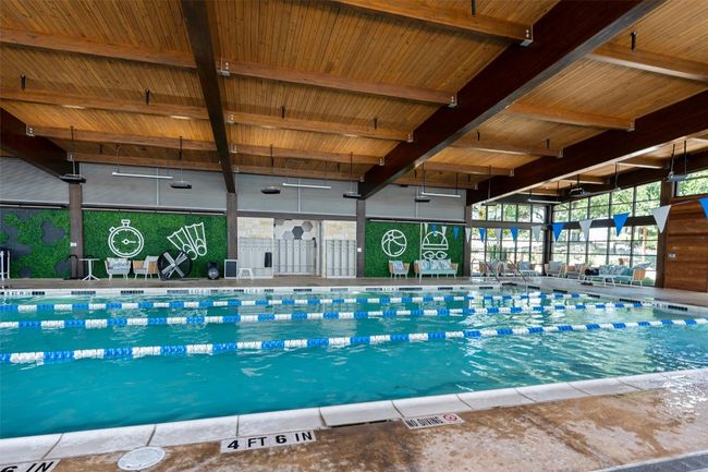 View of indoor pool. Additionally, Kissing Tree has a large, resort-style pool and spa. | Image 37