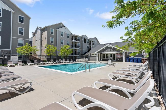 Community pool with a patio | Image 11