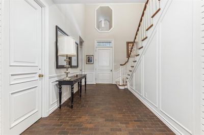 Foyer with a towering ceiling and beautiful chandelier | Image 3