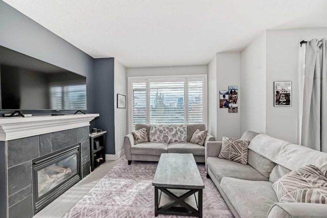 306 - 4 14 Street Nw, Home with 2 bedrooms, 1 bathrooms and 1 parking in Calgary AB | Image 1
