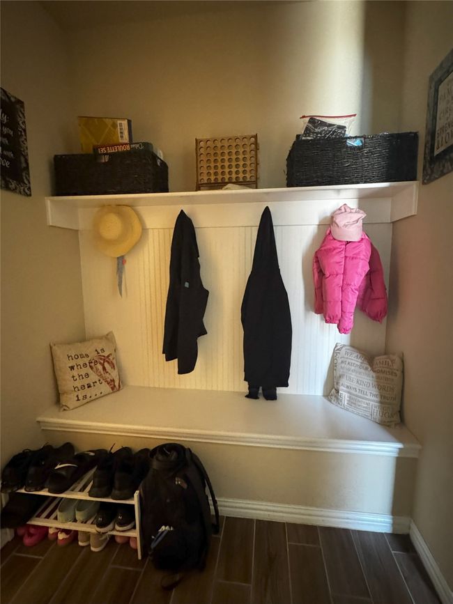 Mudroom with wood finished floors and baseboards | Image 27