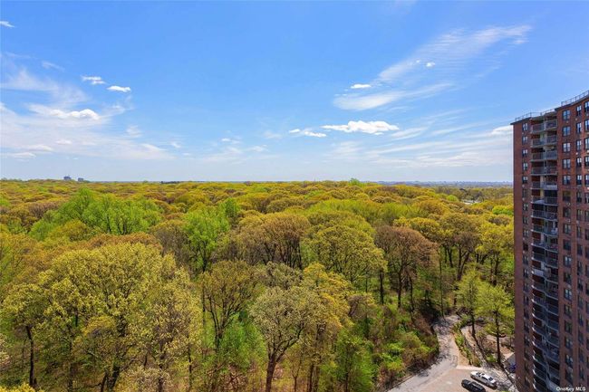 Birds eye view of property with a wooded view | Image 28