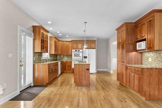 Alternate view of kitchen with doors outside | Image 5