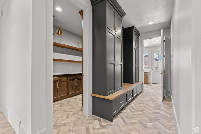 Mudroom featuring recessed lighting and a textured ceiling | Image 13