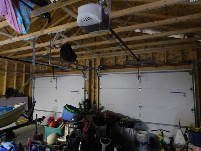 Insulated garage doors, both have garage door openers | Image 41
