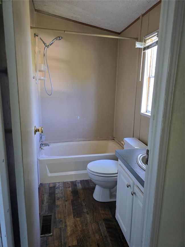 7077 Aztec Trl, House other with 3 bedrooms, 2 bathrooms and null parking in Weatherford TX | Image 15