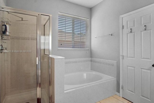 5806 Nw Breezy Brook Ct, House other with 3 bedrooms, 2 bathrooms and null parking in Port St. Lucie FL | Image 21